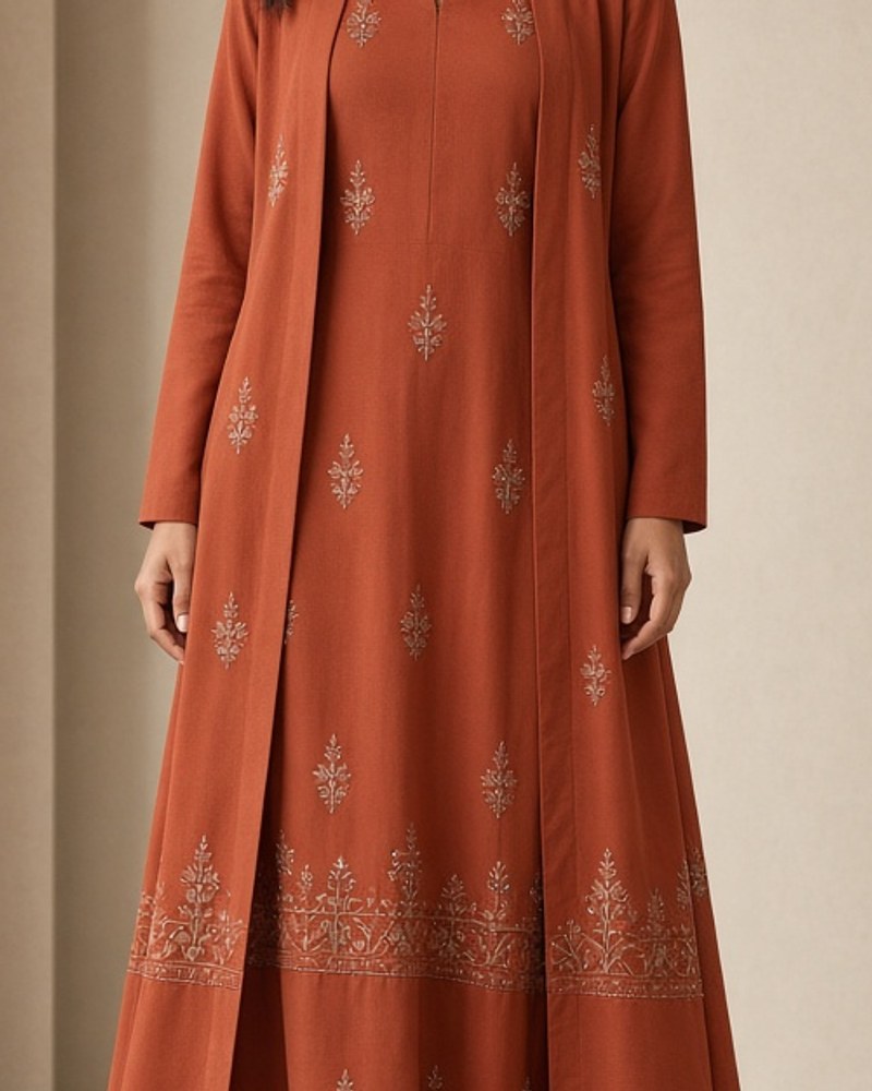Indra Fusion Midi Set by Indra Cape Studio Indo-western midi set in Rust, available to rent