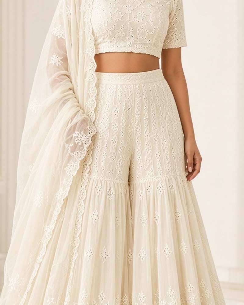Zari Cream Lucknowi Gharara by Zari Atelier Gharara set in Cream, available to rent